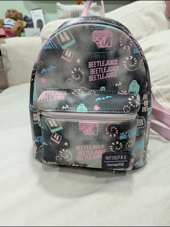 Loungefly Handbags - Loungefly Beetlejuice Mini Backpack - Black with Pink & Teal Print